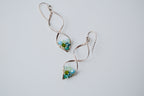 Sterling silver spiral wire earring with multi-blue beads