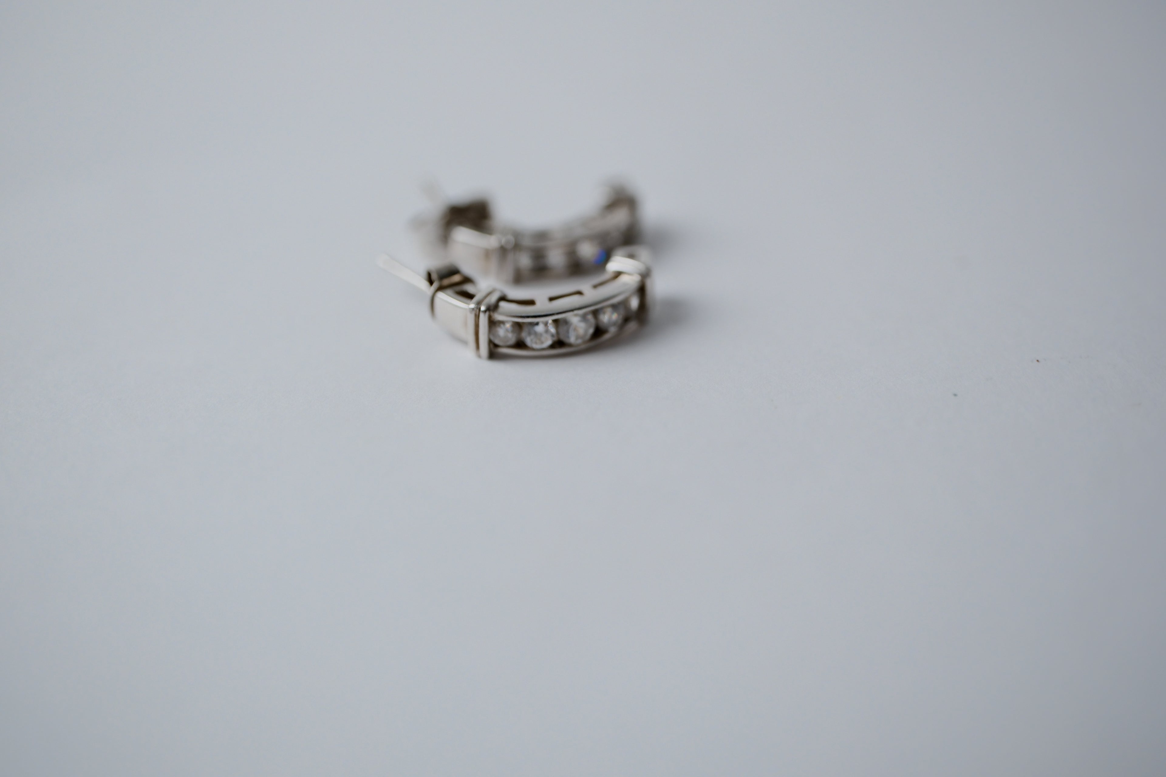 Sterling silver Huggie hoop Cubic Zirconia earrings