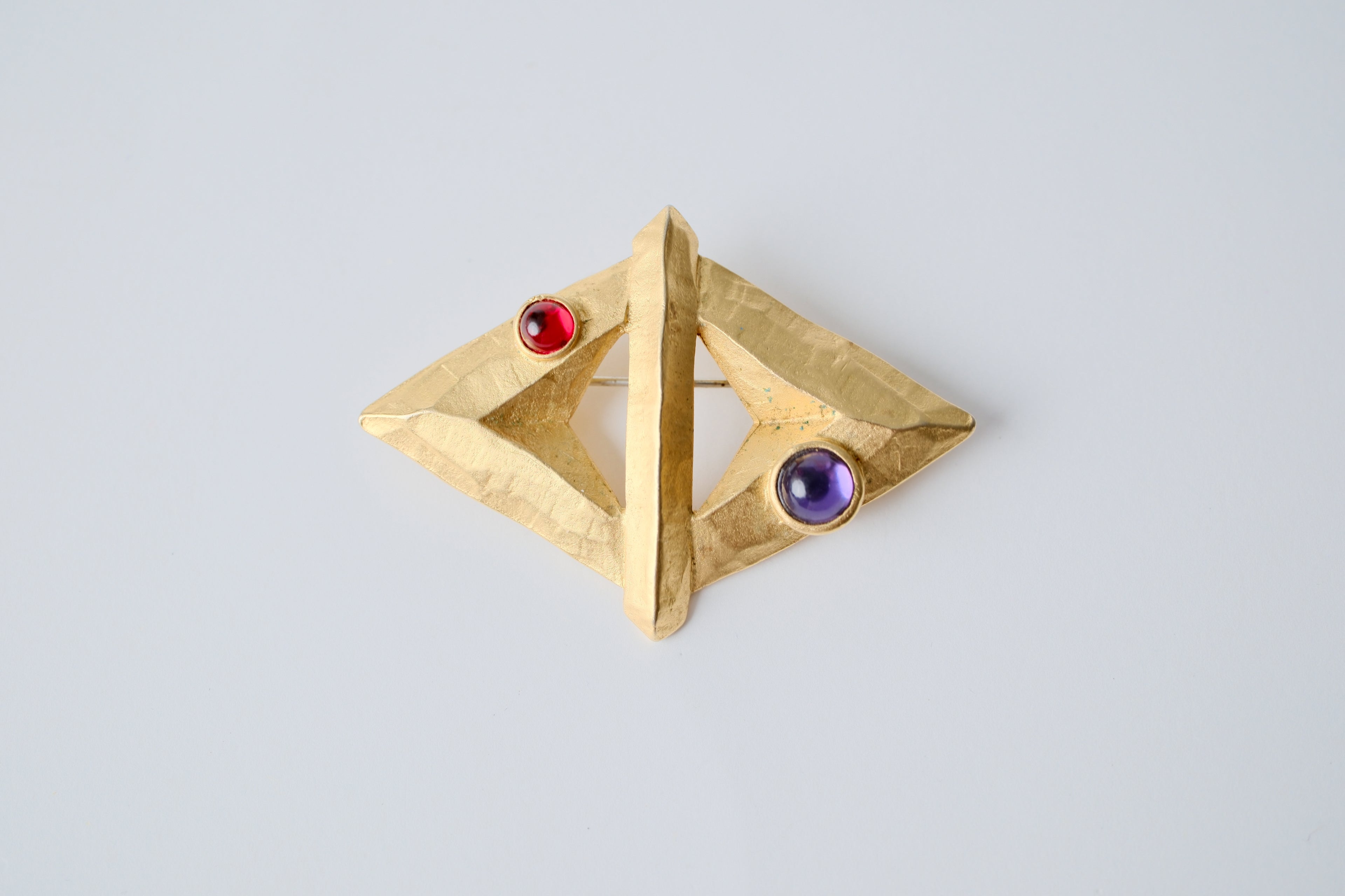Vintage Gold-toned brooch with red and purple stones&nbsp;