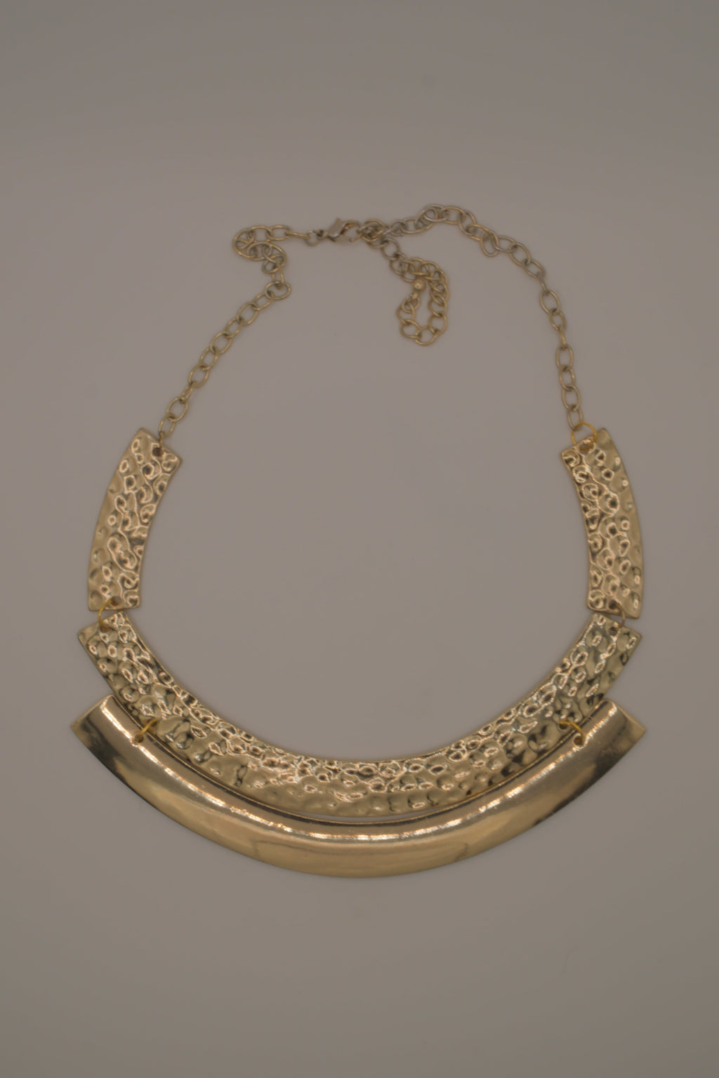 Gold-tone textured metal collar necklace
