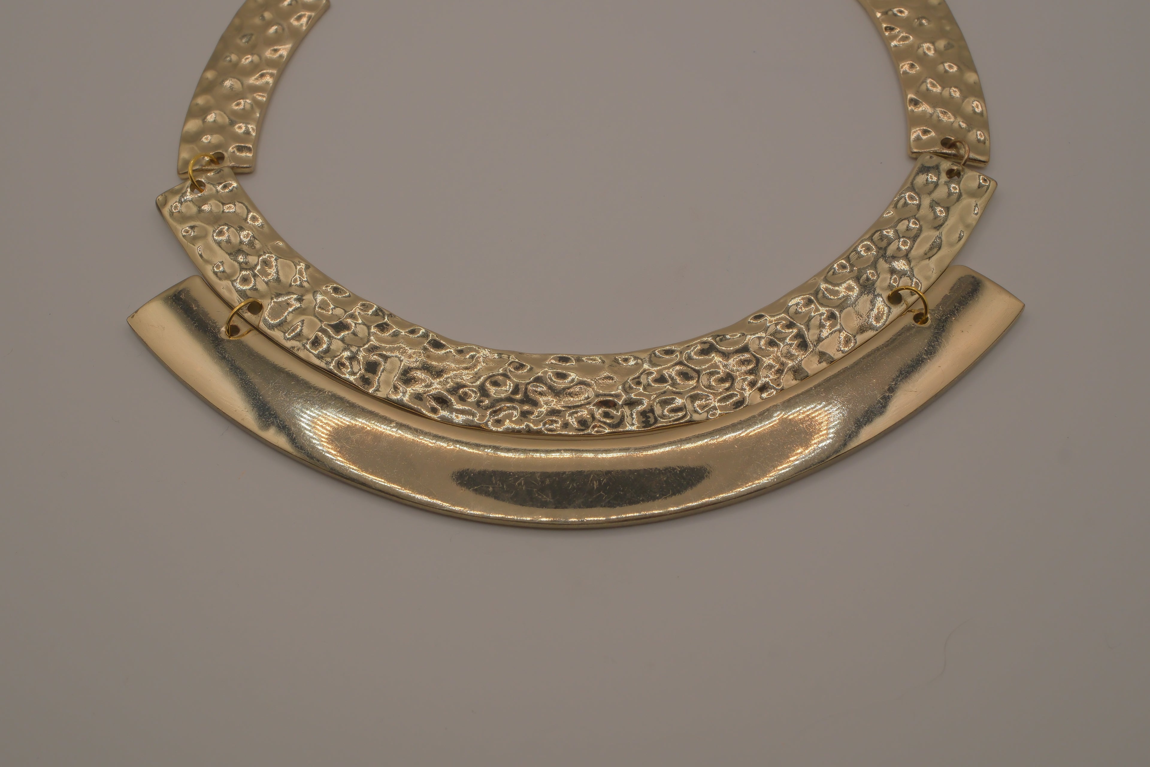 Gold-tone textured metal collar necklace