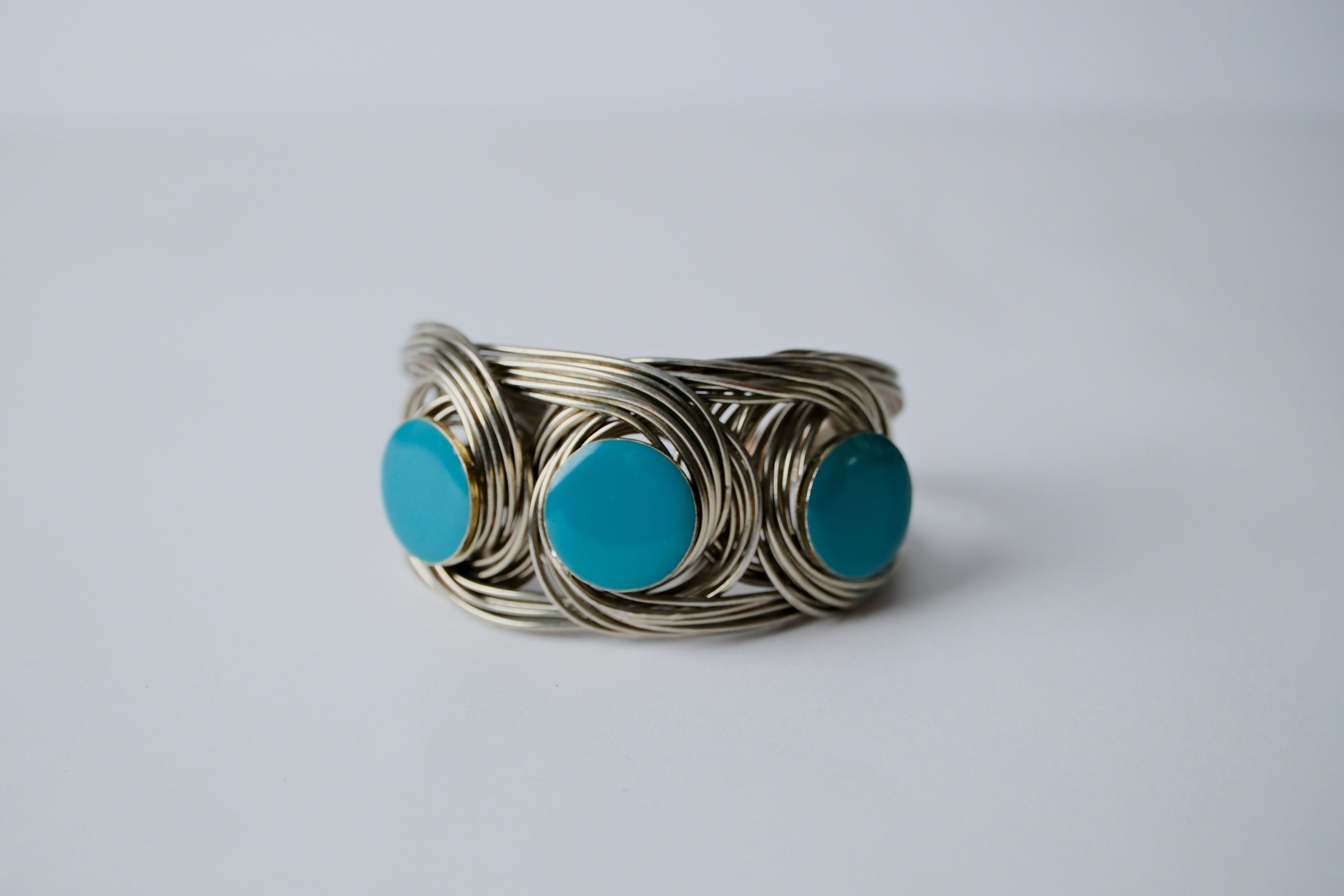 Woven wire cuff bracelet with faux turquoise