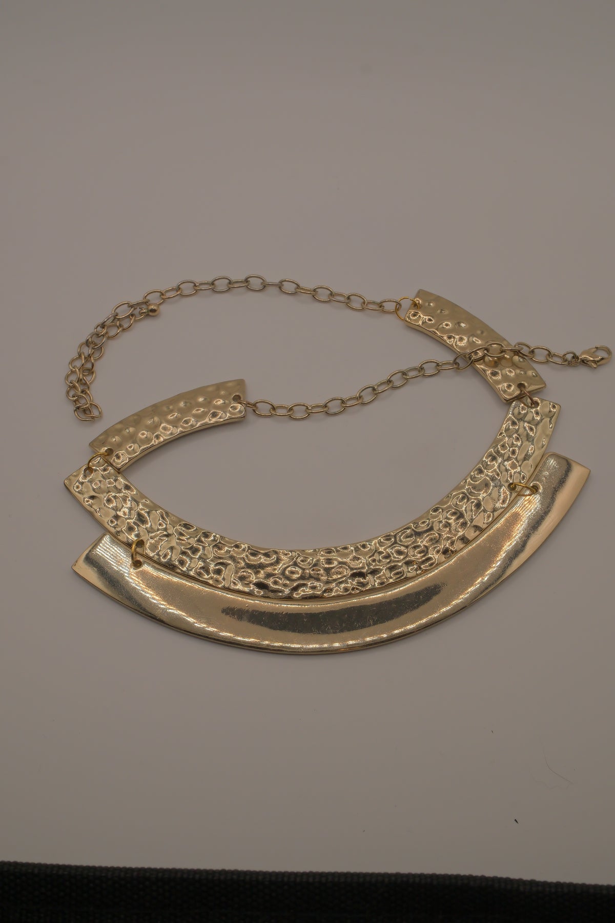 Gold-tone textured metal collar necklace