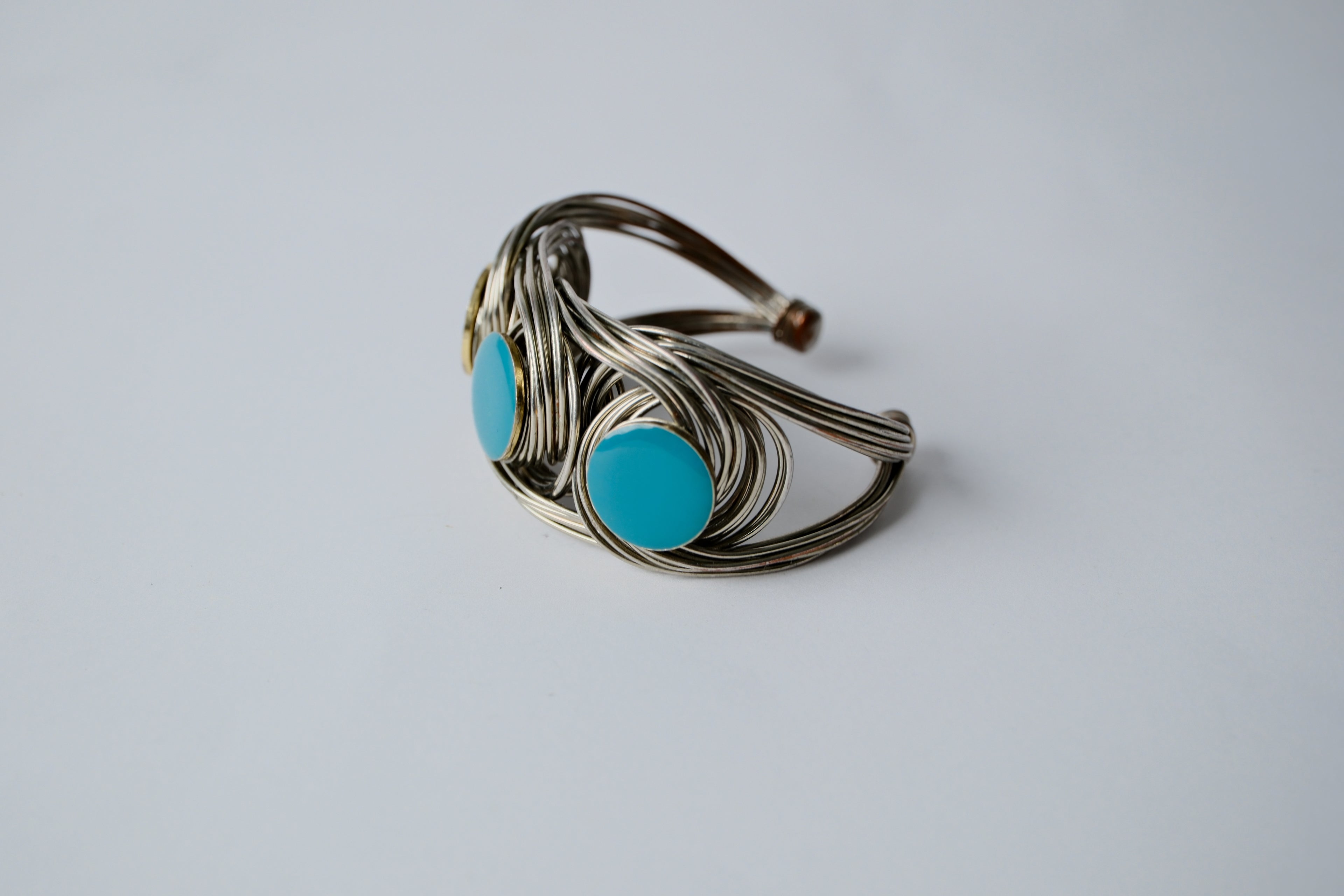 Woven wire cuff bracelet with faux turquoise