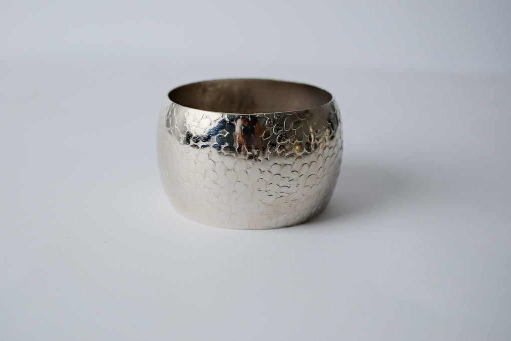 Hammered silver toned thick bracelet