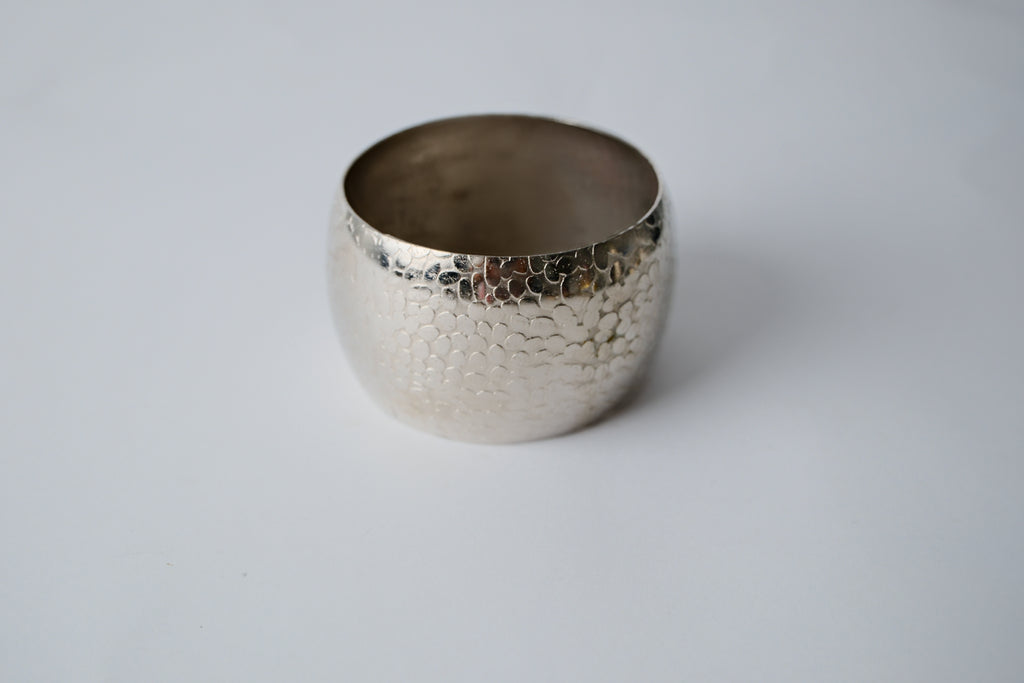 Hammered silver toned thick bracelet