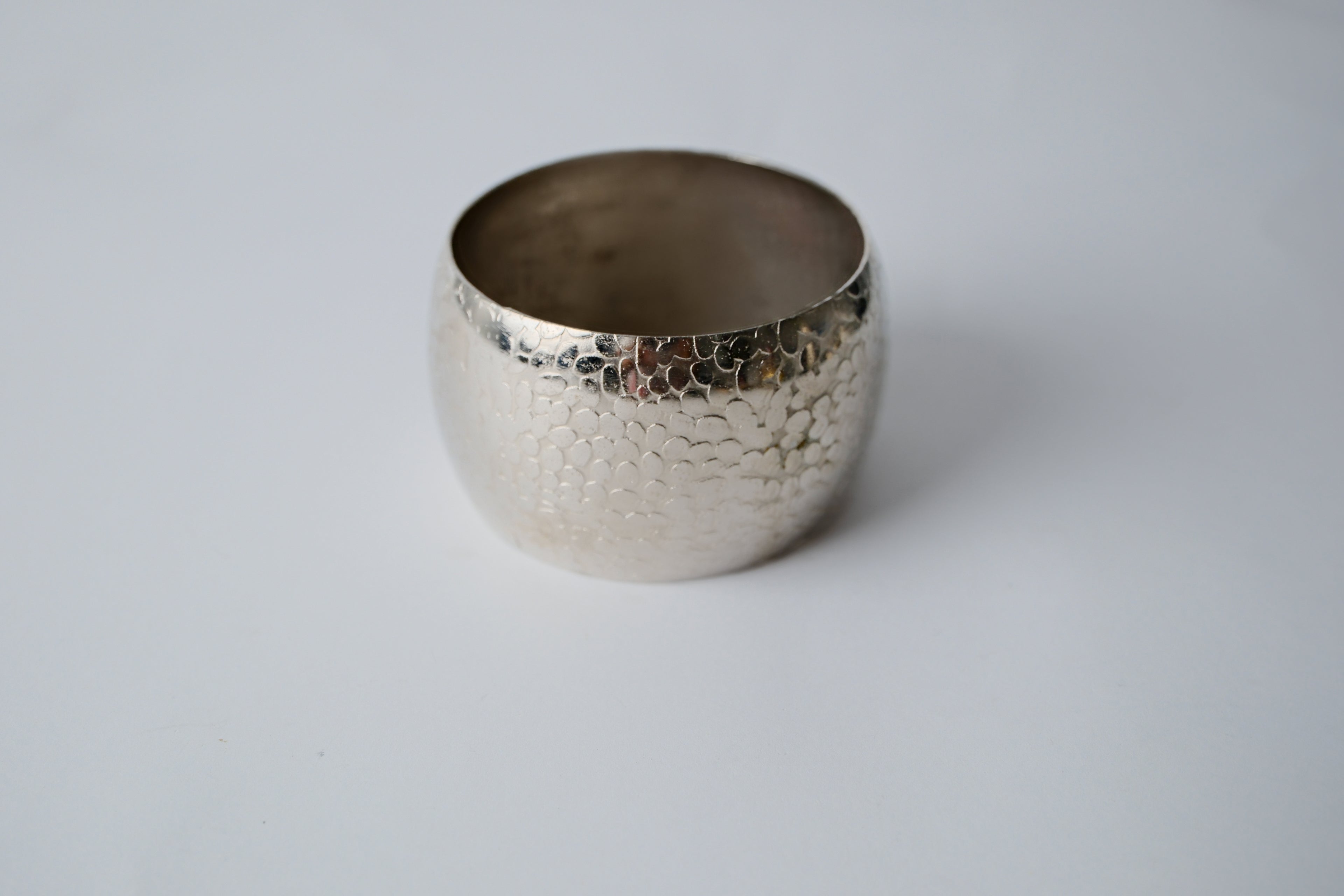 Hammered silver toned thick bracelet