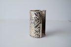 Ornate silver cuff bracelet with a floral design