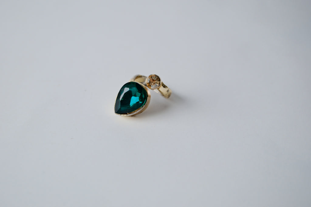 Teardrop-shaped green stone with cubic zirconia Ring