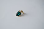 Teardrop-shaped green stone with cubic zirconia Ring