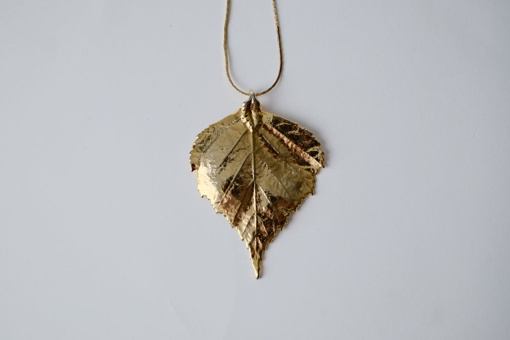 Gold Toned Leaf Pendant Necklace