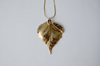 Gold Toned Leaf Pendant Necklace