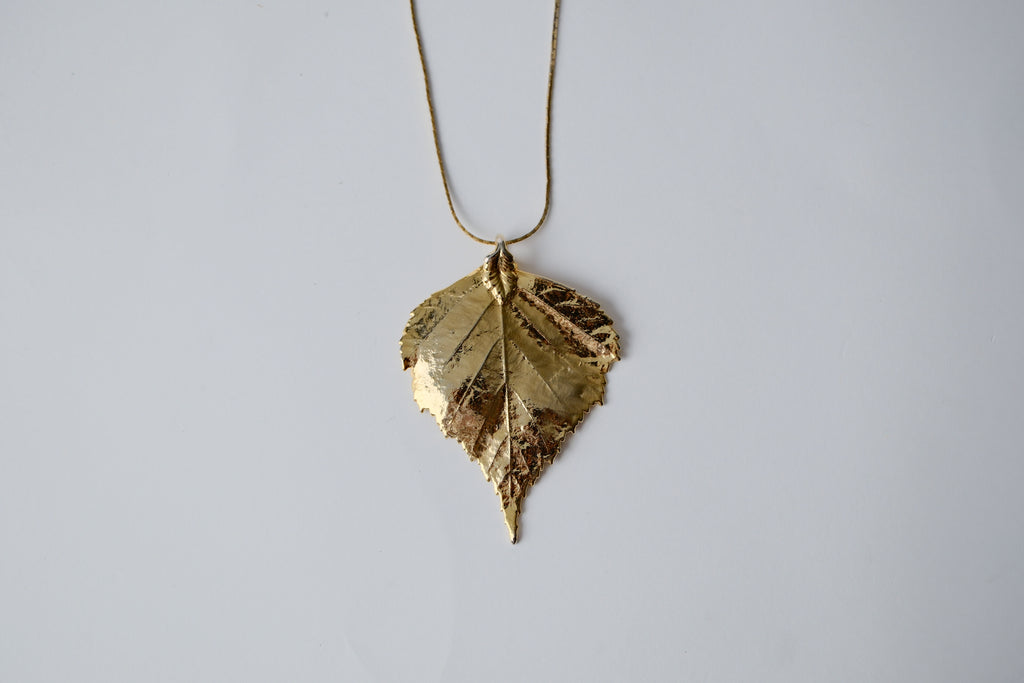 Gold Toned Leaf Pendant Necklace