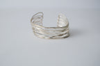Multi-strand hammered silver cuff bracelet