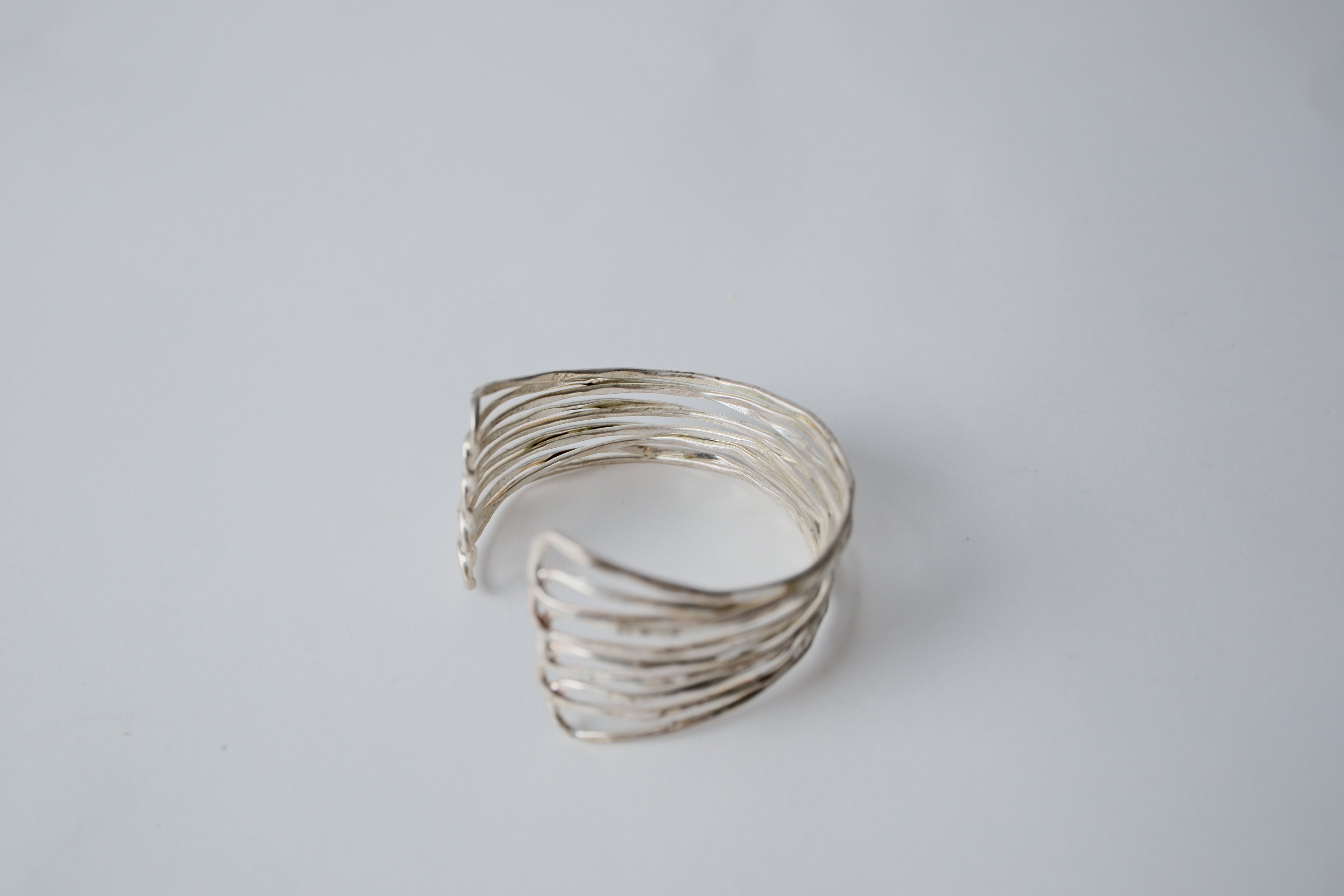 Multi-strand hammered silver cuff bracelet