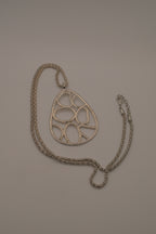 Organic geometric cutout teardrop pendant Necklace