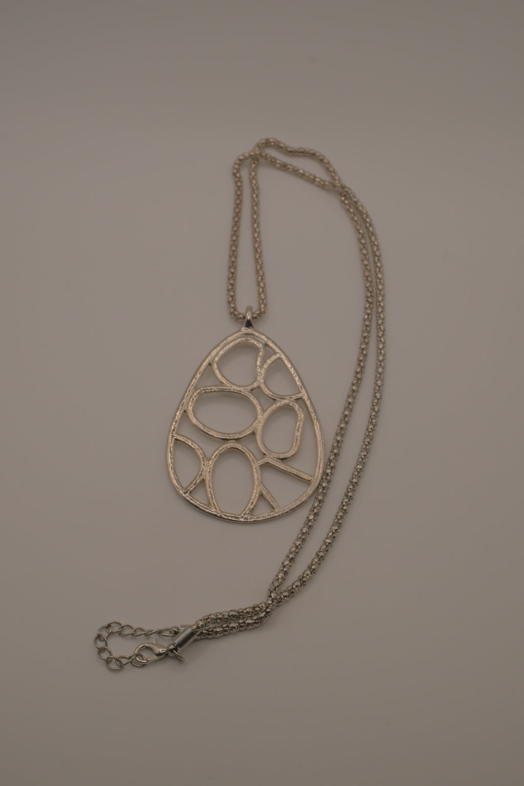 Organic geometric cutout teardrop pendant Necklace