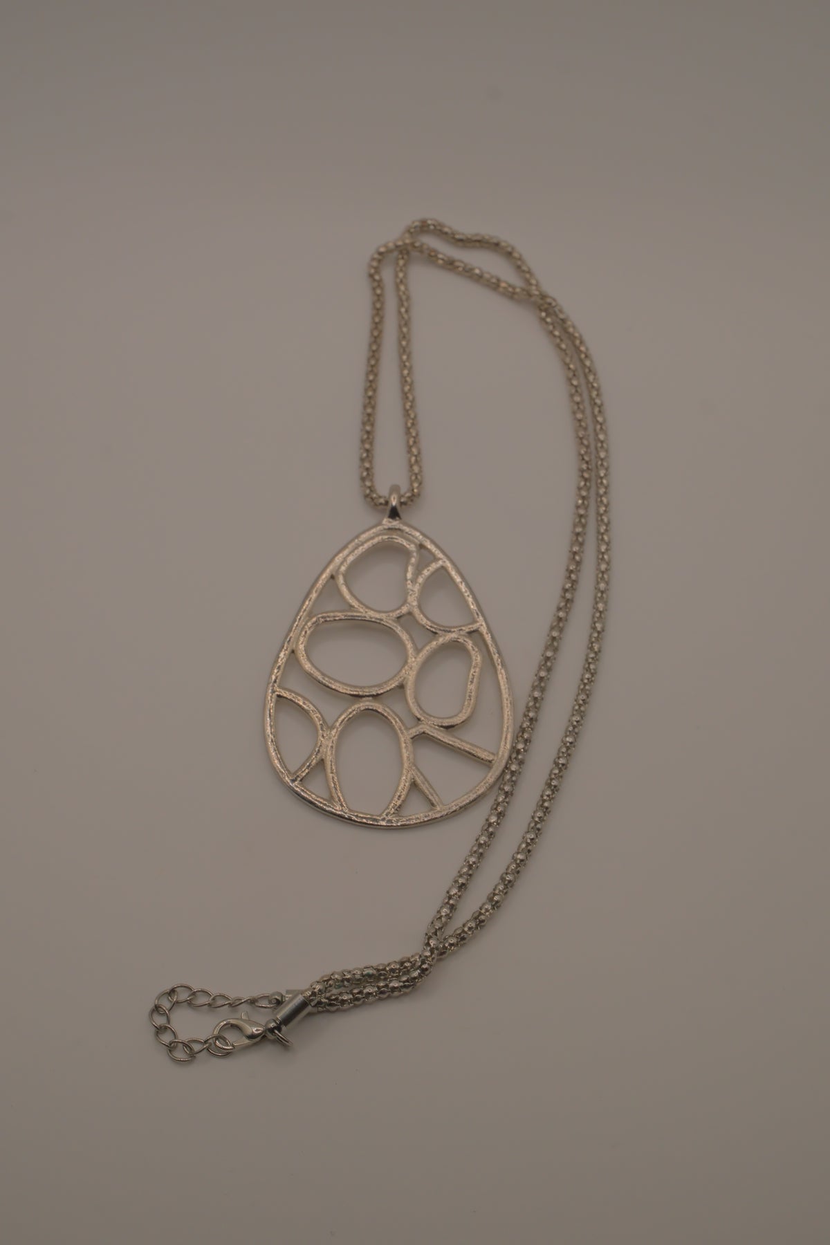 Organic geometric cutout teardrop pendant Necklace