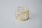 Vintage gold toned spiral cuff bracelet