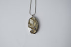 Ivory-colored enamel pendant necklace
