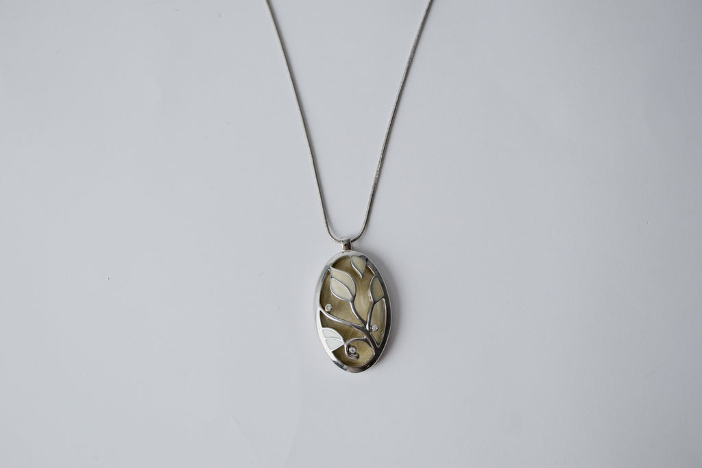 Ivory-colored enamel pendant necklace