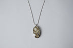 Ivory-colored enamel pendant necklace