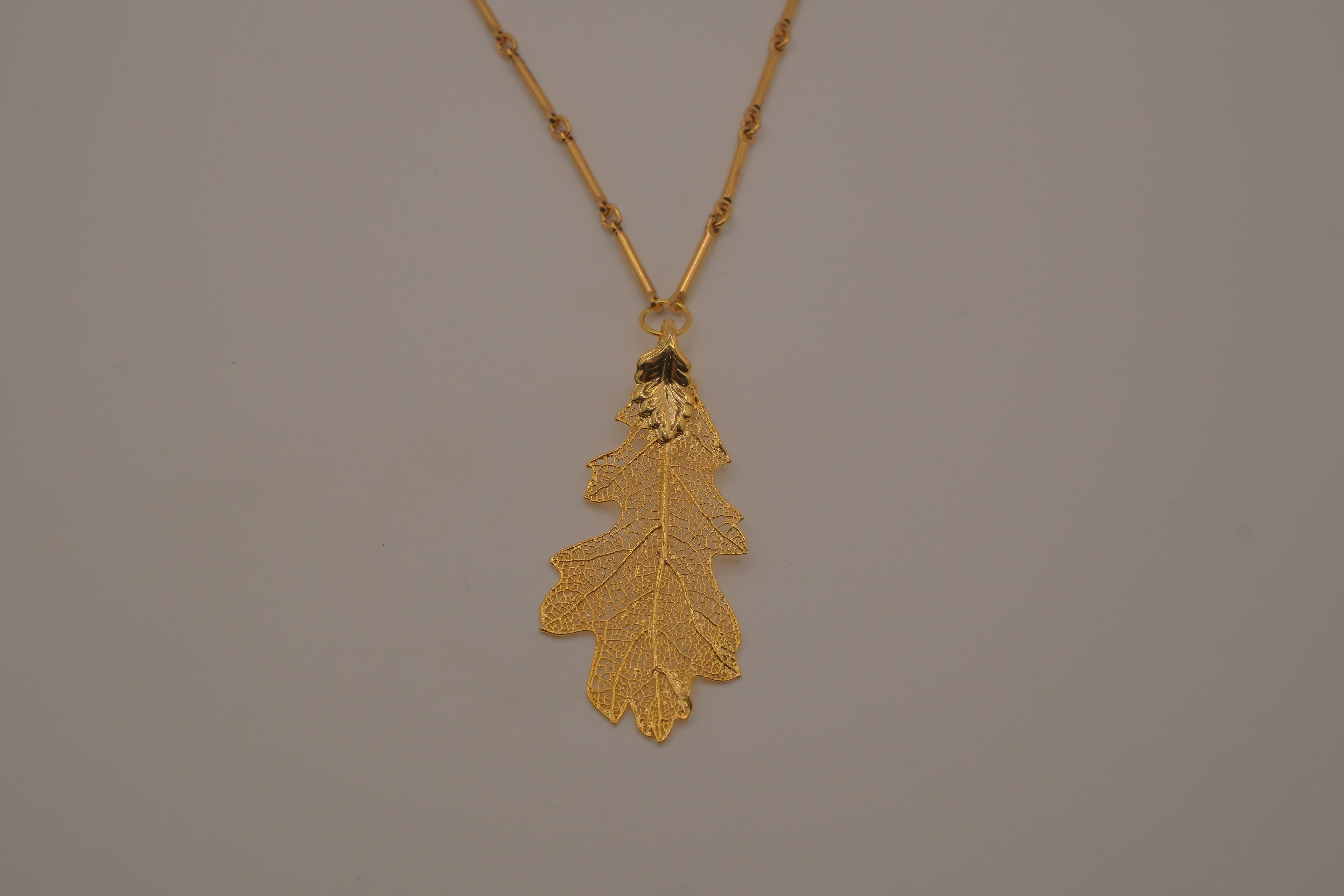 Gold toned Oak leaf pendant necklace