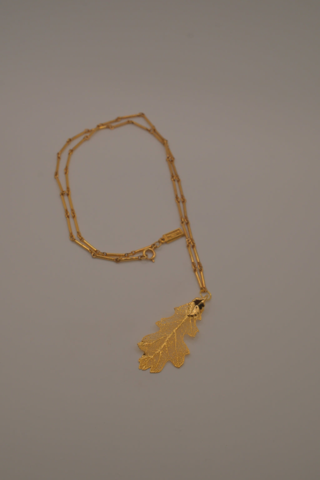 Gold toned Oak leaf pendant necklace