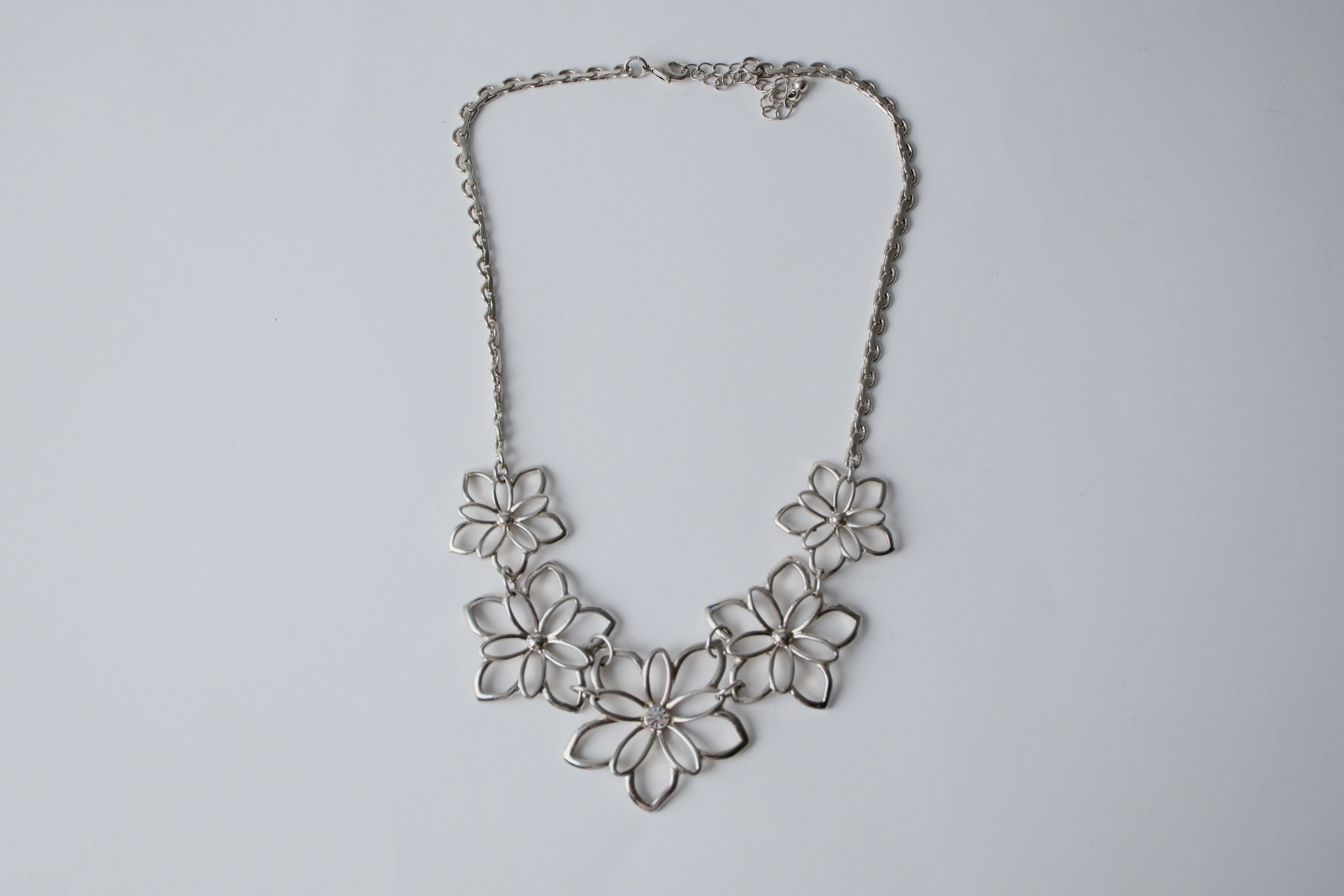 Silver flower bib necklace