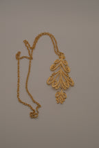 1960s vintage Sarah Coventry textured scroll design dangle pendant/brooch
