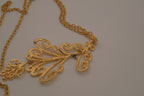 1960s vintage Sarah Coventry textured scroll design dangle pendant/brooch