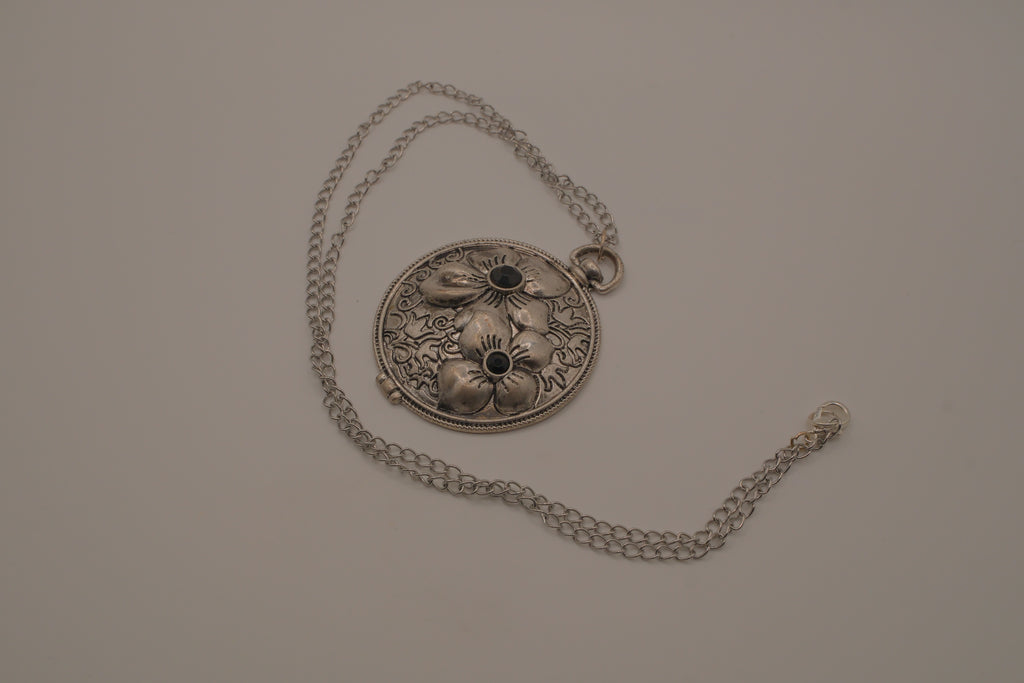 Antiqued silver-tone floral pendant