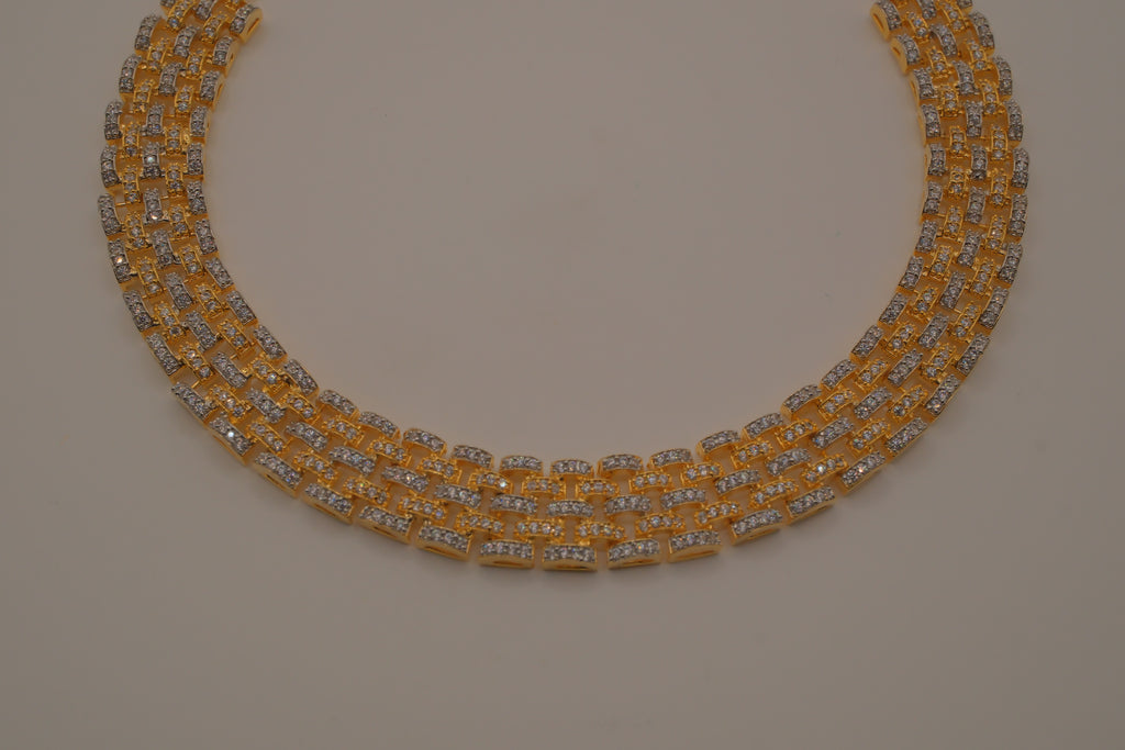Multi-layered gold and cubic zirconia stones collar necklace