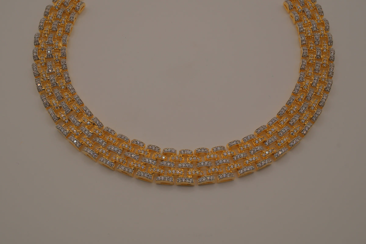 Multi-layered gold and cubic zirconia stones collar necklace