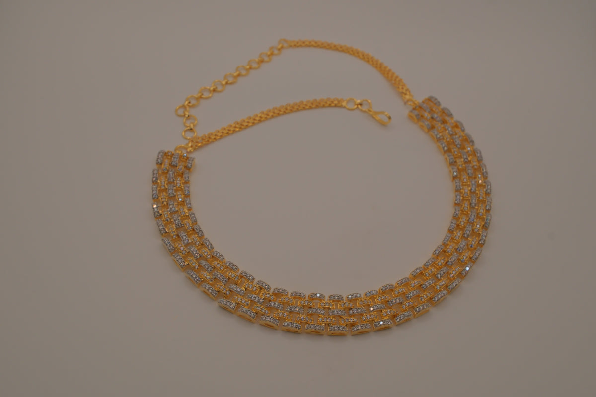 Multi-layered gold and cubic zirconia stones collar necklace