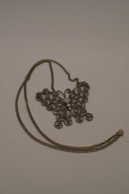 Antique brass-finished filigree butterfly bib necklace