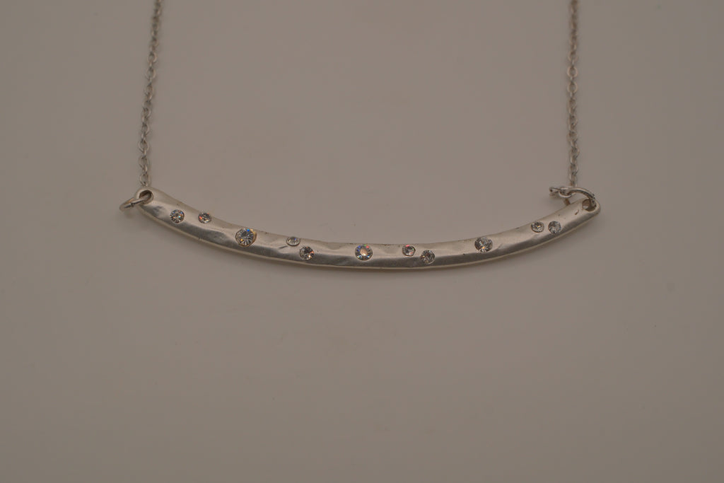 Silver tone curved bar necklace