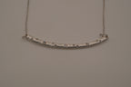 Silver tone curved bar necklace