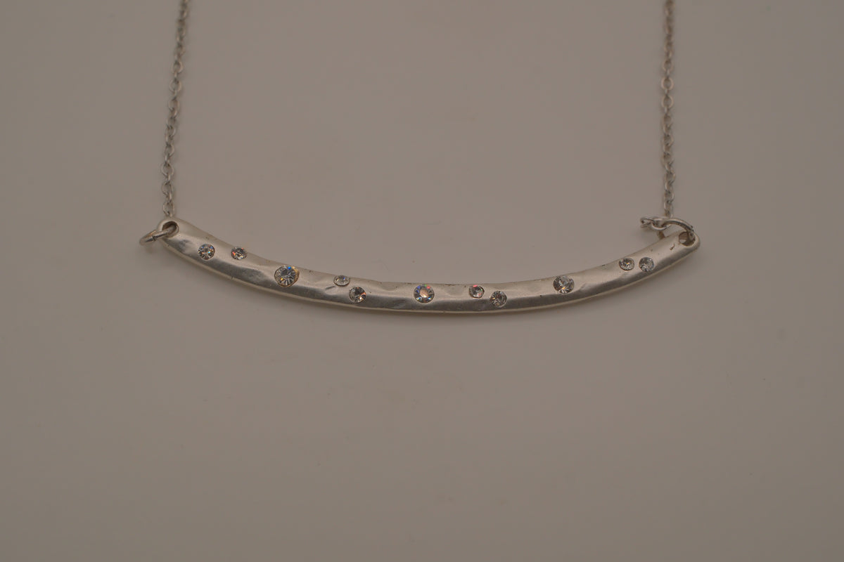 Silver tone curved bar necklace