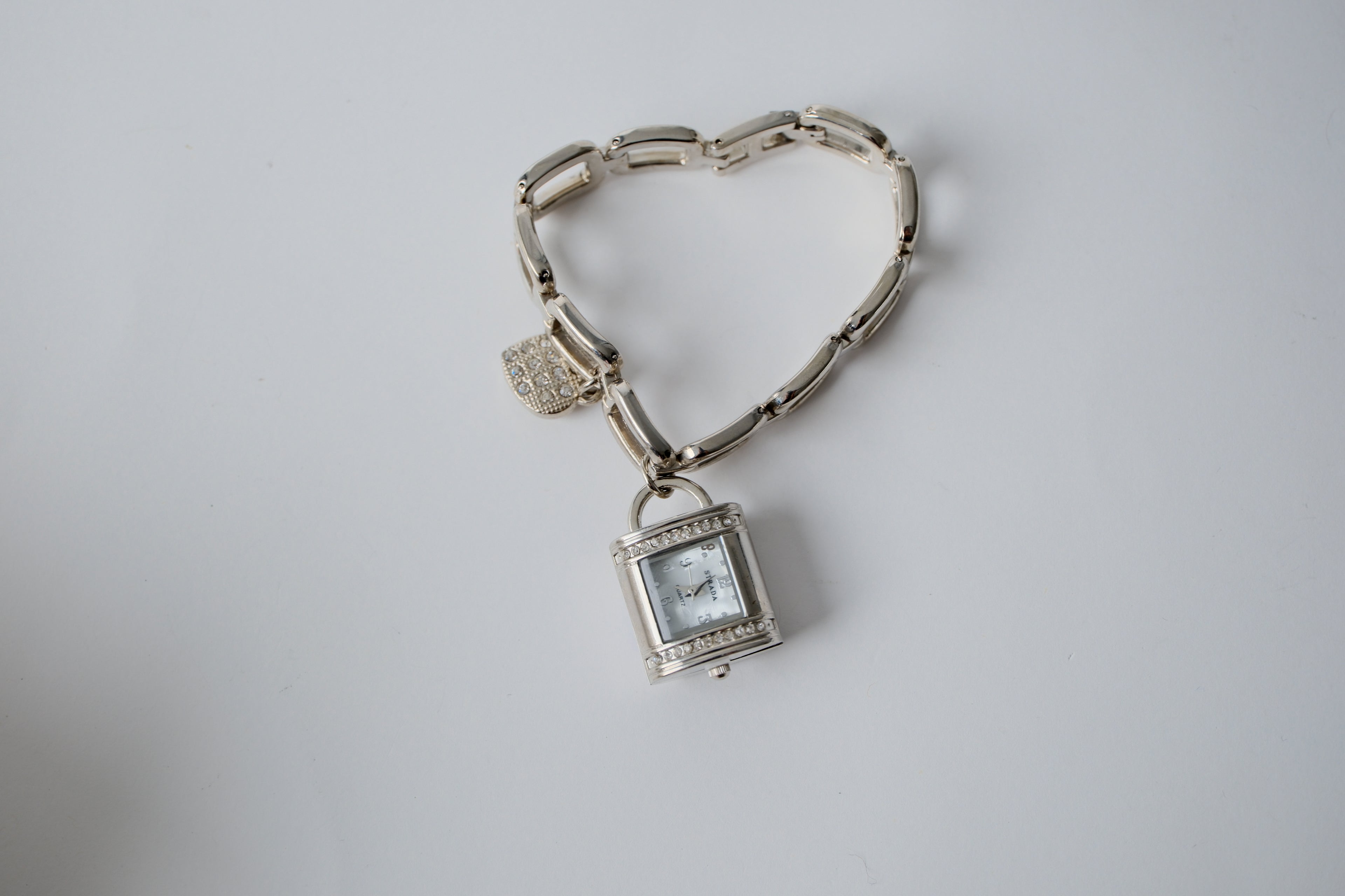 Silver-toned Strada charm bracelet watch