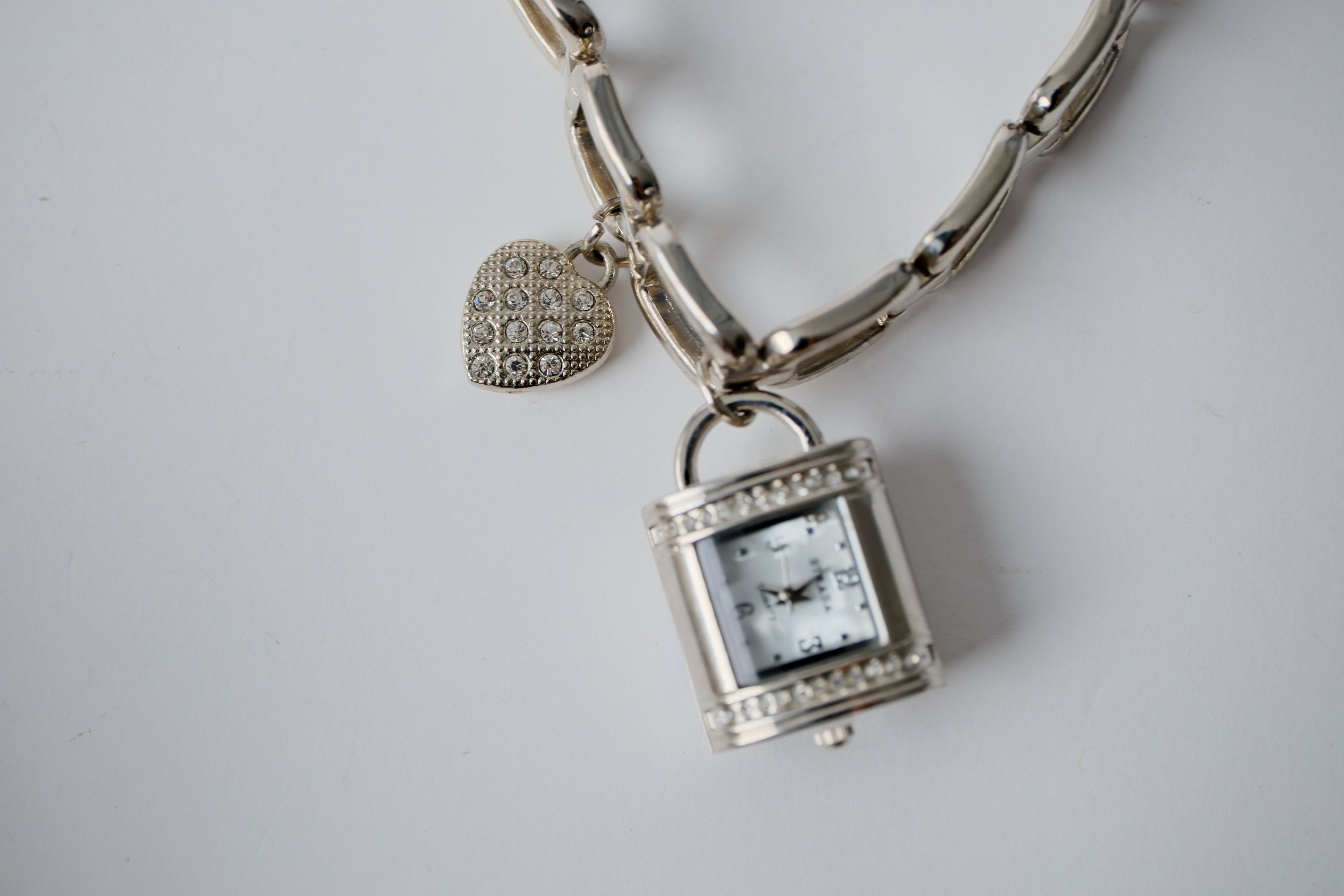Silver-toned Strada charm bracelet watch