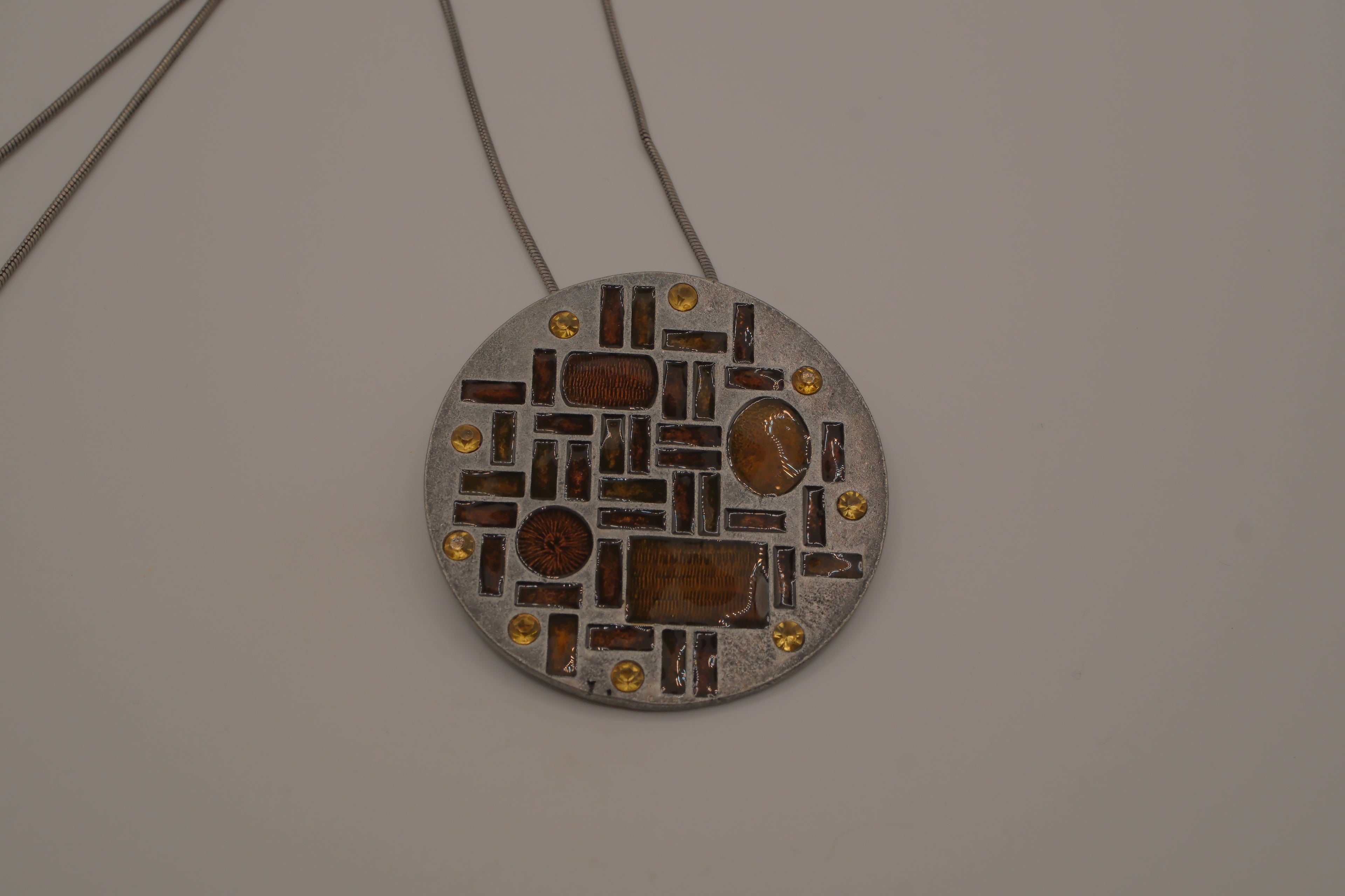 Hammered Silver Pendant with Golden Topaz Enameled Geometric Shapes