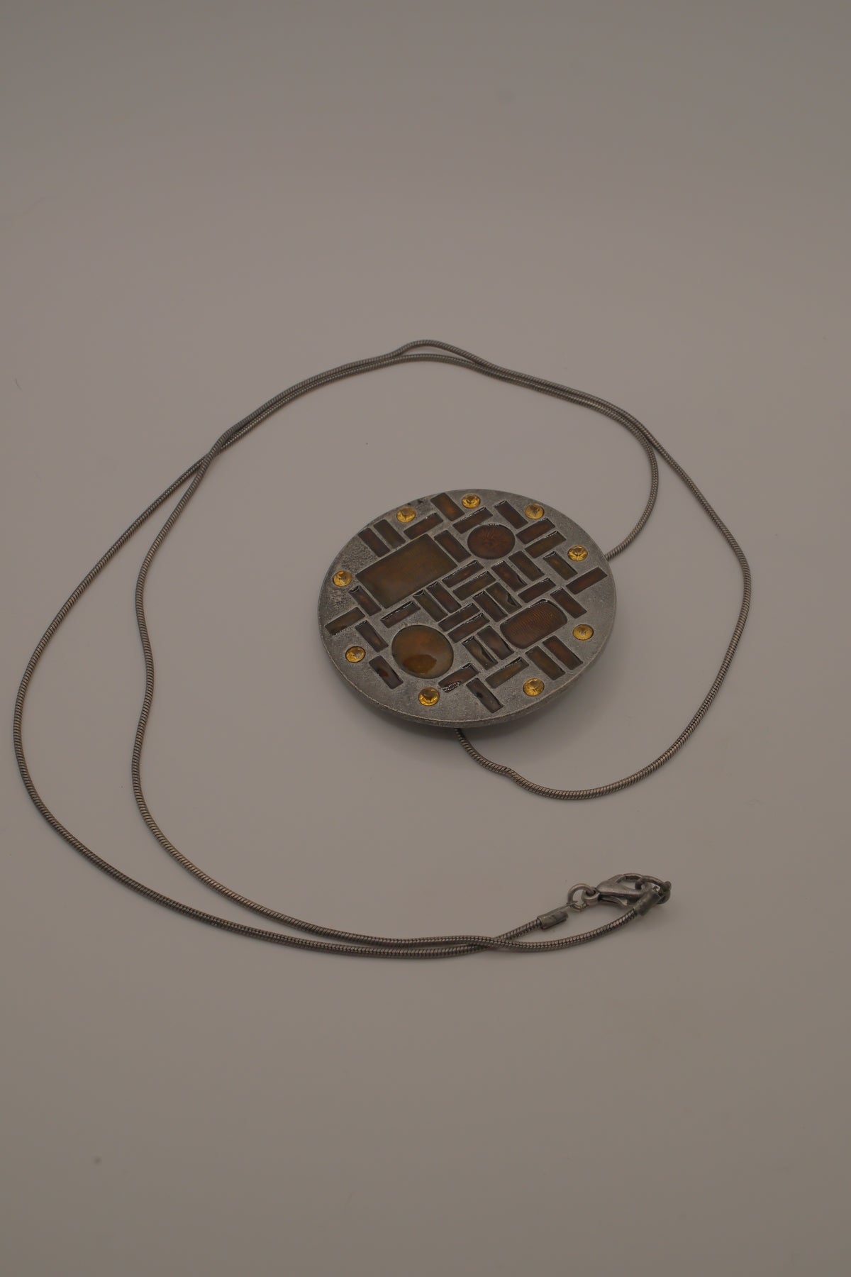 Hammered Silver Pendant with Golden Topaz Enameled Geometric Shapes