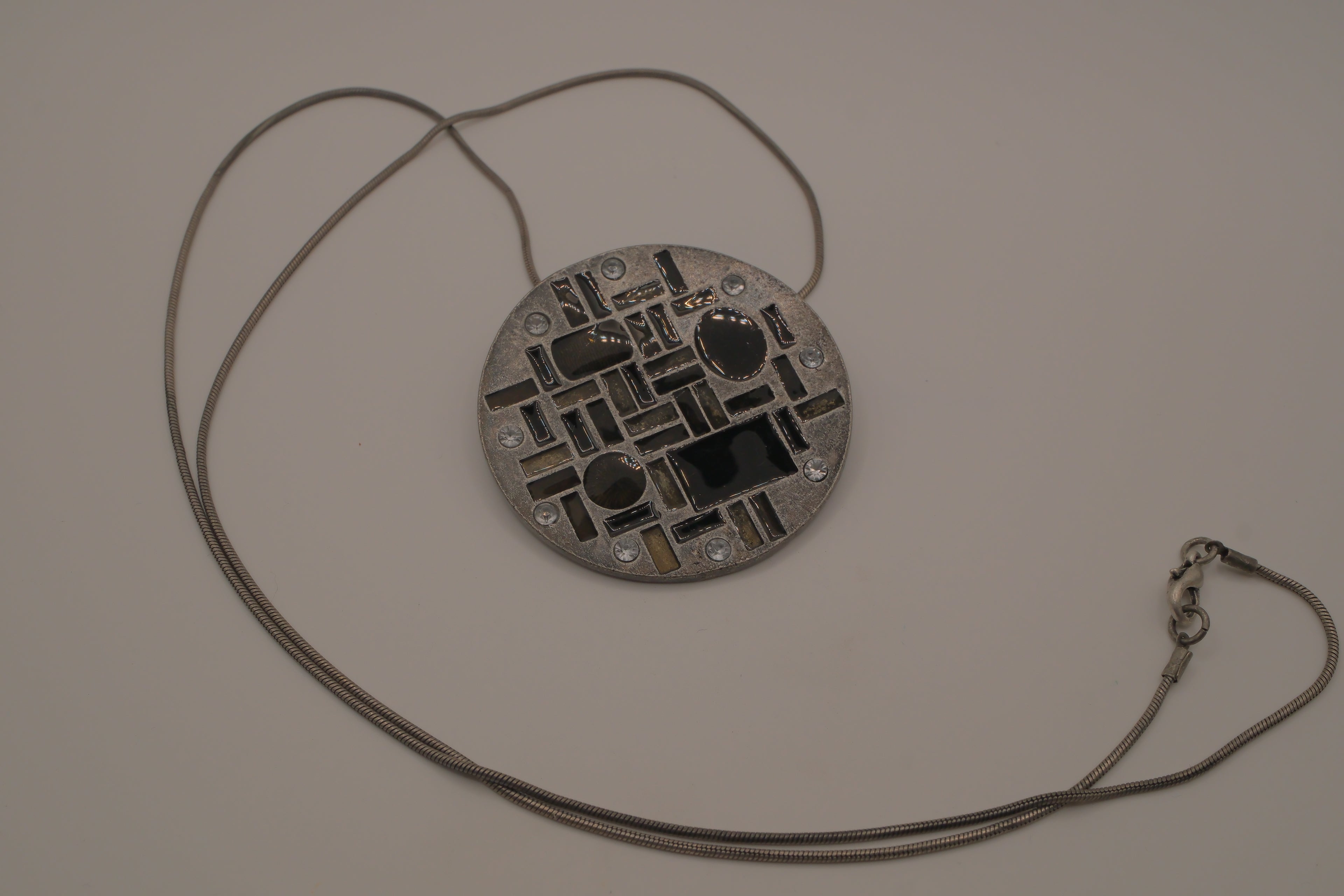 Hammered Silver Pendant with Black Enameled Geometric Shapes