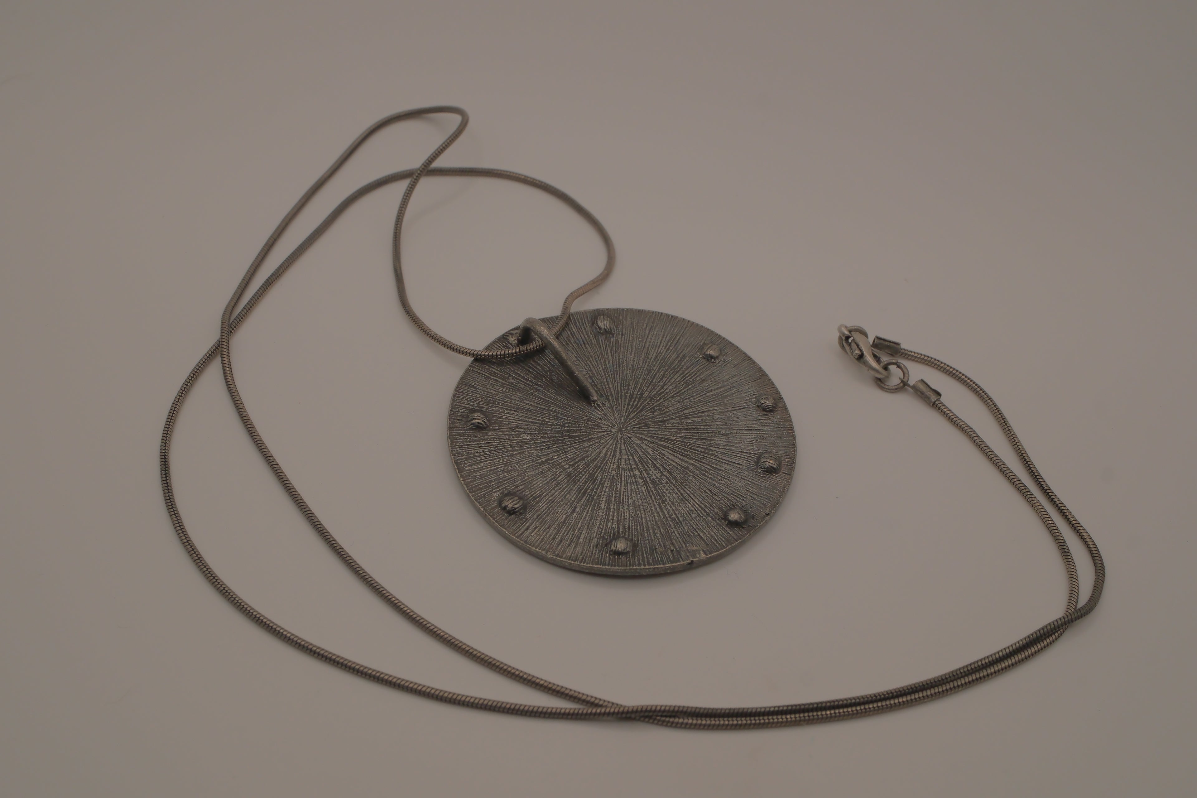 Hammered Silver Pendant with Black Enameled Geometric Shapes