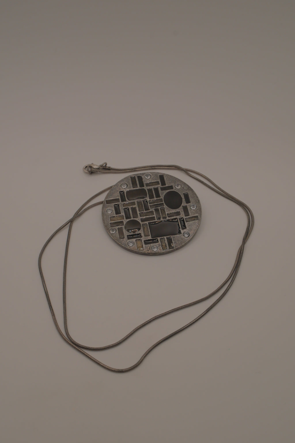 Hammered Silver Pendant with Black Enameled Geometric Shapes