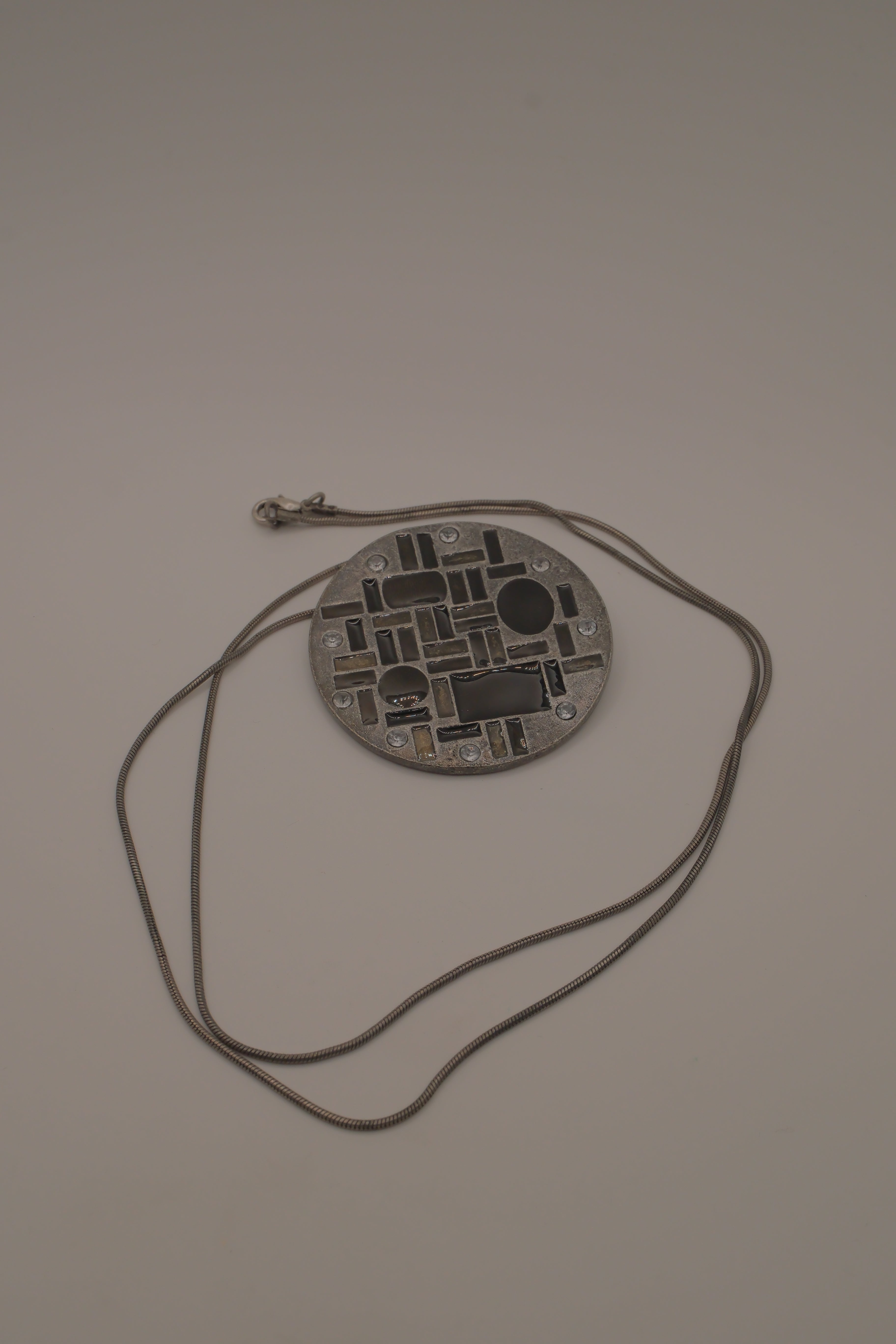 Hammered Silver Pendant with Black Enameled Geometric Shapes