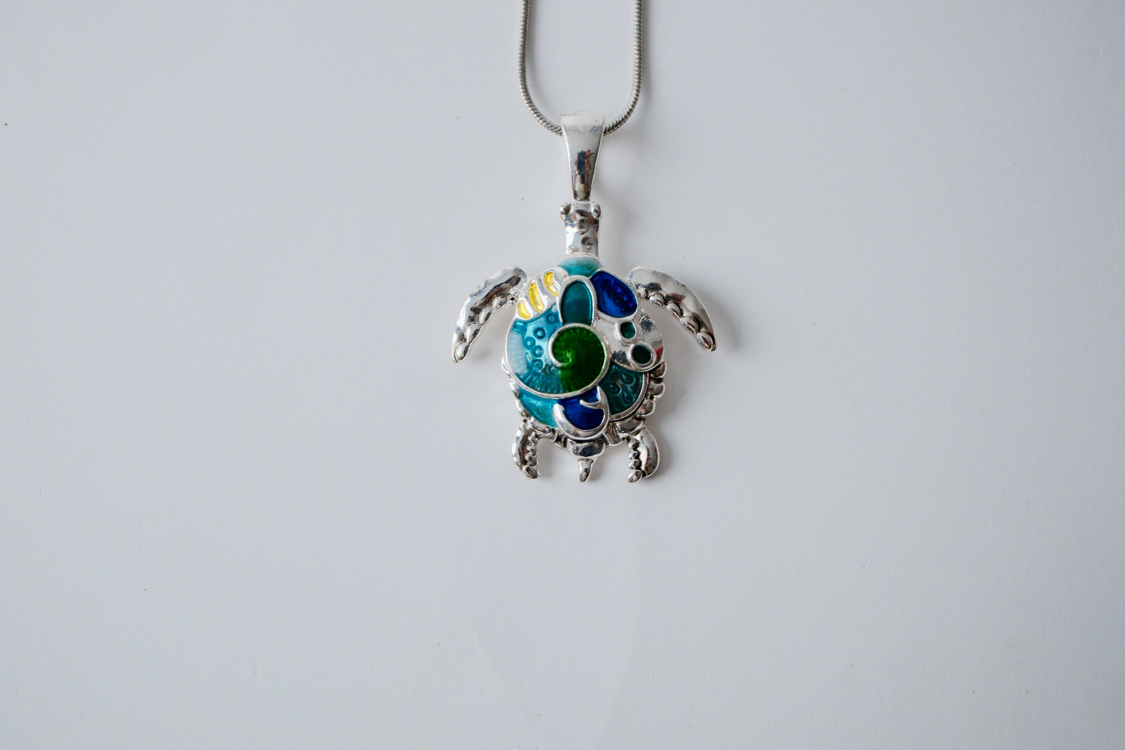 Turtle pendant on a Lia Sophia necklace