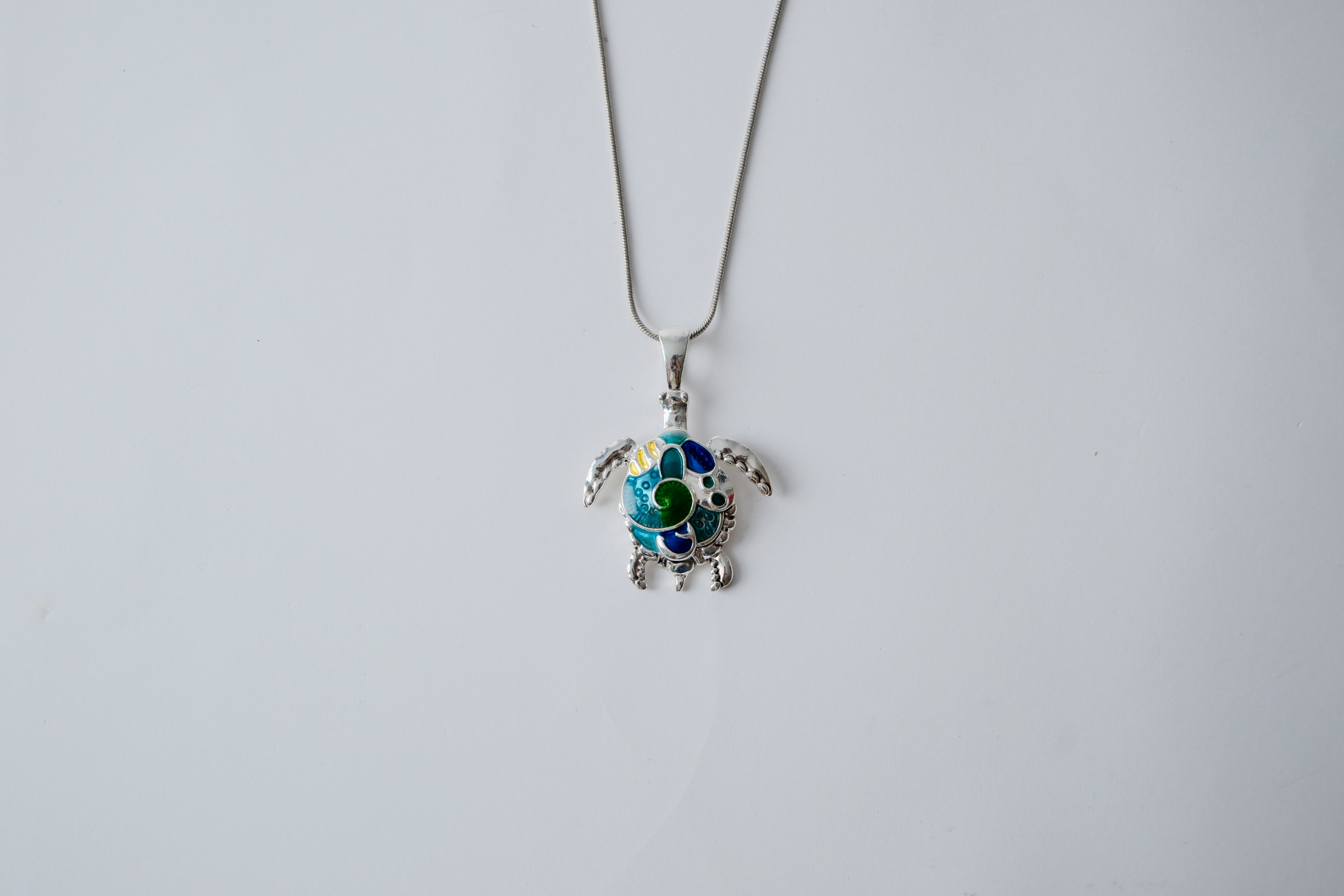 Turtle pendant on a Lia Sophia necklace