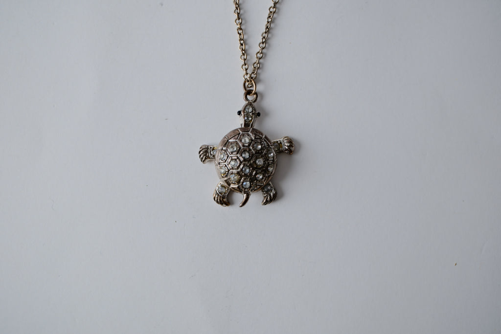 Silver swimming sea turtle necklace